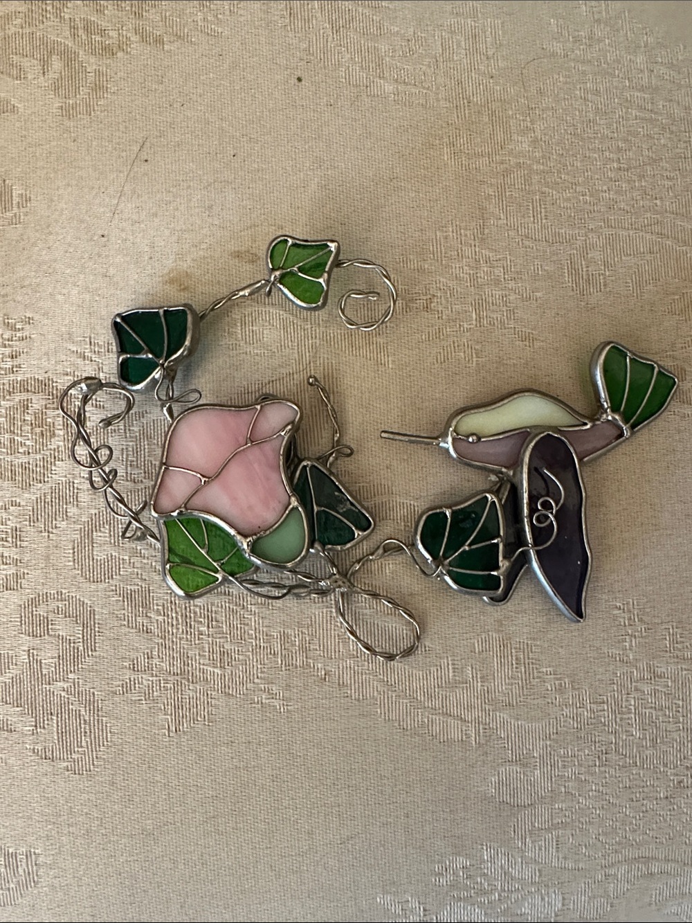 Handcrafted purple hummingbird on flowers stained glass piece with lead came